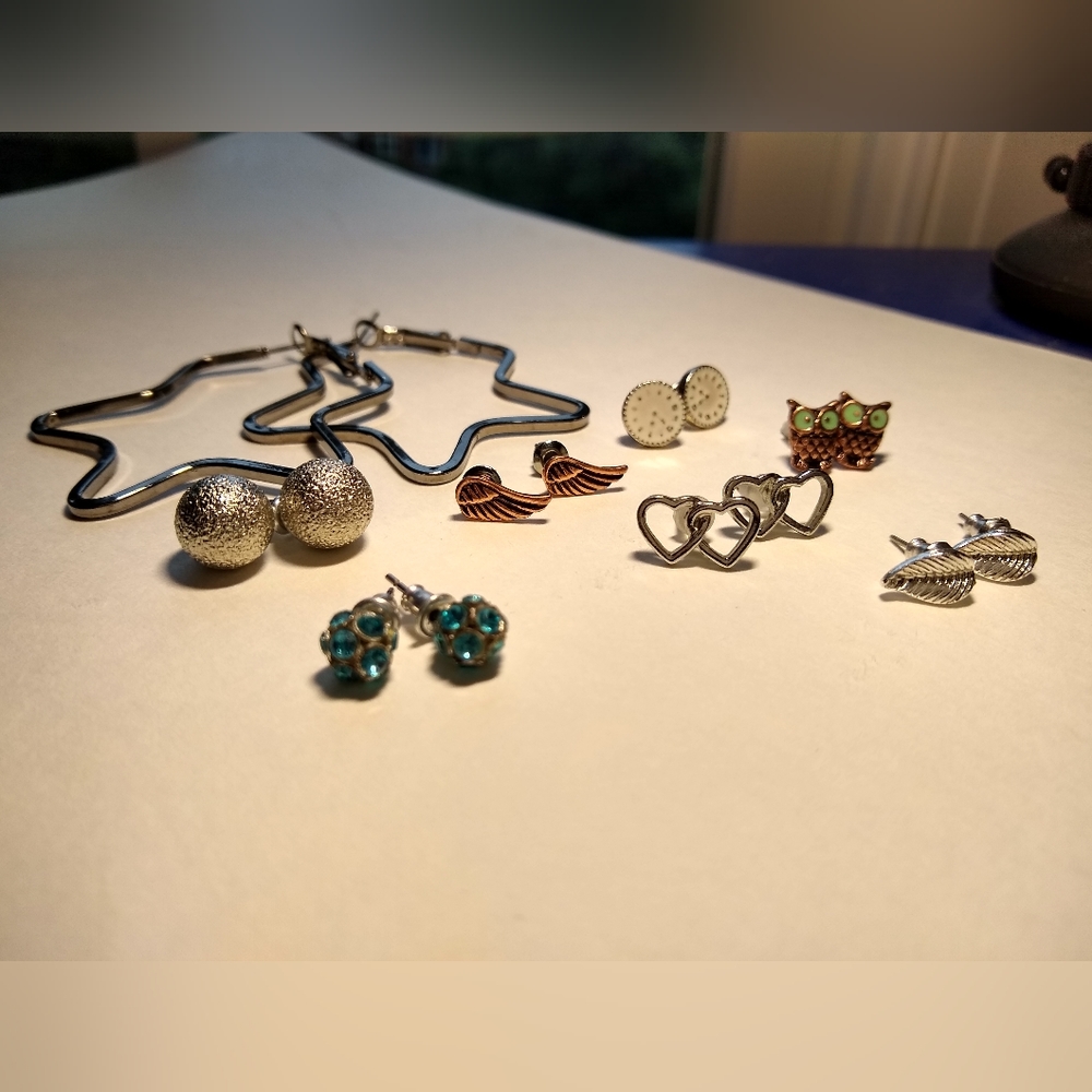 8 pairs of silver and bronze assorted stud earrings